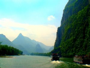 Winding its way around the karst peaks,the li river has to be one of the most beautiful rivers in china. Winding its way around the karst peaks,the li river has to be one of the most beautiful rivers in china.